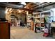 Unfinished basement with ample storage space and exposed ceiling at 11883 E Fair Ave, Greenwood Village, CO 80111