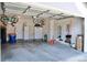 Spacious garage with high ceilings, bike rack storage, and built-in cabinets at 11883 E Fair Ave, Greenwood Village, CO 80111