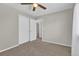 Clean and bright bedroom with a closet and door leading to an additional room at 275 S Pembrook St, Castle Rock, CO 80104
