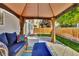 Aesthetic backyard gazebo with comfortable seating and views of the lawn at 275 S Pembrook St, Castle Rock, CO 80104