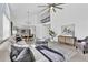 Bright open floor plan with high ceilings that connects living area, dining space and kitchen for today's modern living at 275 S Pembrook St, Castle Rock, CO 80104