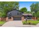 Beautiful two-story home with a stone-accented facade, attached garage and well-manicured lawn at 4269 Carter Trl, Boulder, CO 80301