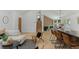 Open-concept home with hardwood floors, a modern staircase, and combined living spaces at 4269 Carter Trl, Boulder, CO 80301