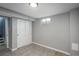This finished basement features wood-look floors, closet, and a single window at 11645 Lincoln St, Northglenn, CO 80233