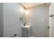 Updated bathroom features modern vanity, fixtures, and neutral color palette at 11645 Lincoln St, Northglenn, CO 80233