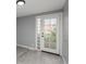 Door leading to a deck, featuring glass blocks on its side for added privacy at 11645 Lincoln St, Northglenn, CO 80233