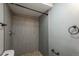 This bathroom features a tiled standing shower with updated fixtures and hardware at 11645 Lincoln St, Northglenn, CO 80233