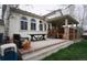 Outdoor seating area with a covered patio, and stairs leading up to the house at 11506 Greenbriar Ln, Parker, CO 80138