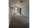 The vaulted ceiling of this bedroom is enhanced by the window seat overlooking the landscaped yard at 11506 Greenbriar Ln, Parker, CO 80138