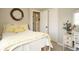 Inviting bedroom with a comfy bed, side table, and neutral colors at 11506 Greenbriar Ln, Parker, CO 80138