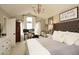 Bright and airy bedroom with a large window and vaulted ceilings at 11506 Greenbriar Ln, Parker, CO 80138