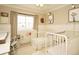Cozy Bedroom with two cribs, neutral colors, and plenty of natural light at 11506 Greenbriar Ln, Parker, CO 80138