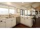 Kitchen area boasts granite countertops, stainless steel dishwasher, and sink overlooking open floor plan at 11506 Greenbriar Ln, Parker, CO 80138
