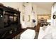 Open concept space featuring a living room, home office, and kitchen at 11506 Greenbriar Ln, Parker, CO 80138