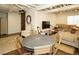 Inviting living area featuring a dining table and open-concept layout for versatile living at 11506 Greenbriar Ln, Parker, CO 80138