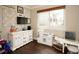Charming playroom with hardwood floors, large windows, and a ' kitchen set at 11506 Greenbriar Ln, Parker, CO 80138