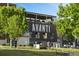 Avanti F&B featuring an open-air rooftop seating area and street-level view at 3410 Pecos St, Denver, CO 80211
