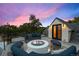 Enjoy the view from this rooftop deck with an outdoor firepit and comfortable seating at 3410 Pecos St, Denver, CO 80211