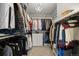 Spacious walk-in closet with ample hanging space and shelving, perfect for organizing wardrobe essentials at 3410 Pecos St, Denver, CO 80211