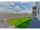 Well-maintained backyard features a lush lawn, perfect for outdoor enjoyment at 4505 Cholla Trl, Castle Rock, CO 80104
