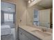 Bathroom featuring a sleek vanity with views into the bedroom at 4505 Cholla Trl, Castle Rock, CO 80104