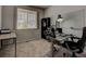 Functional home office featuring a desk, chair, window with blinds and carpet at 4505 Cholla Trl, Castle Rock, CO 80104
