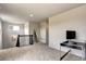 Upstairs landing area featuring a desk, dark railing and neutral walls at 4505 Cholla Trl, Castle Rock, CO 80104