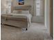 A spacious bedroom with a plush bed and an abundance of natural light at 4505 Cholla Trl, Castle Rock, CO 80104