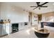 Spacious game room with wet bar, foosball table, neutral colors, and modern decor at 13794 Honey Hush Trl, Parker, CO 80134