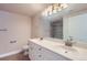 Bright bathroom with double sinks, vanity storage and modern fixtures at 4500 Baseline Rd # 3101, Boulder, CO 80303