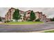 Charming exterior view of a multi-story building with lush landscaping and inviting curb appeal at 4500 Baseline Rd # 3101, Boulder, CO 80303