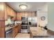 Well-lit kitchen featuring stainless steel appliances and granite countertops, perfect for culinary enthusiasts at 4500 Baseline Rd # 3101, Boulder, CO 80303