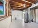 Unfinished basement with visible utilities and exposed ceiling, ready for customization at 12238 Monroe Dr, Thornton, CO 80241