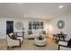 Cozy living room with contemporary furnishings, neutral decor, and ample natural light at 2202 S Grape St, Denver, CO 80222