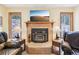 Close up view of the cozy fireplace at 13314 Spruce Creek Cir, Larkspur, CO 80118