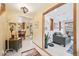 View of the open concept entry way showcasing the living room and kitchen at 13314 Spruce Creek Cir, Larkspur, CO 80118