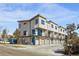 Contemporary apartments boast sleek design, private balconies, and individual garages for convenient living at 1678 Tabor St, Lakewood, CO 80215