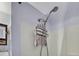 Shower head in the bathroom with light purple paint, showing simple fixtures at 274 S Lincoln St, Denver, CO 80209