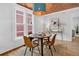 Cozy dining room featuring a round table, unique ceiling, and stylish decor at 274 S Lincoln St, Denver, CO 80209