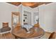 Dining area showcasing a round table, hardwood floors, and a decorative ceiling at 274 S Lincoln St, Denver, CO 80209