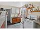 Eat-in kitchen is equipped with white appliances, oak cabinets, and sink at 274 S Lincoln St, Denver, CO 80209