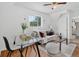 Cozy living room with comfortable seating area, glass table, and natural light at 274 S Lincoln St, Denver, CO 80209