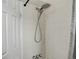 Shower stall showcasing adjustable shower head and clean white tile at 274 S Lincoln St, Denver, CO 80209