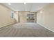 Spacious basement featuring neutral carpet, recessed lighting, and walkout access at 20781 E 48Th Pl, Denver, CO 80249