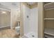 Modern bathroom features a white walk-in shower and neutral walls at 20781 E 48Th Pl, Denver, CO 80249
