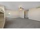 Spacious living room with neutral walls and ceiling fan at 20781 E 48Th Pl, Denver, CO 80249