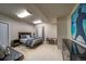 This bedroom features a dark bed frame, a desk, and an art piece at 21682 E Stroll Ave, Parker, CO 80138