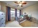 bedroom with ceiling fan, and curtains at 21682 E Stroll Ave, Parker, CO 80138