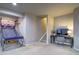 Home office space featuring a desk and chair next to a basketball game at 21682 E Stroll Ave, Parker, CO 80138