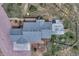 Aerial view of the house showcasing the roof, patio, and surrounding property at 6957 Black Forest Dr, Elizabeth, CO 80107